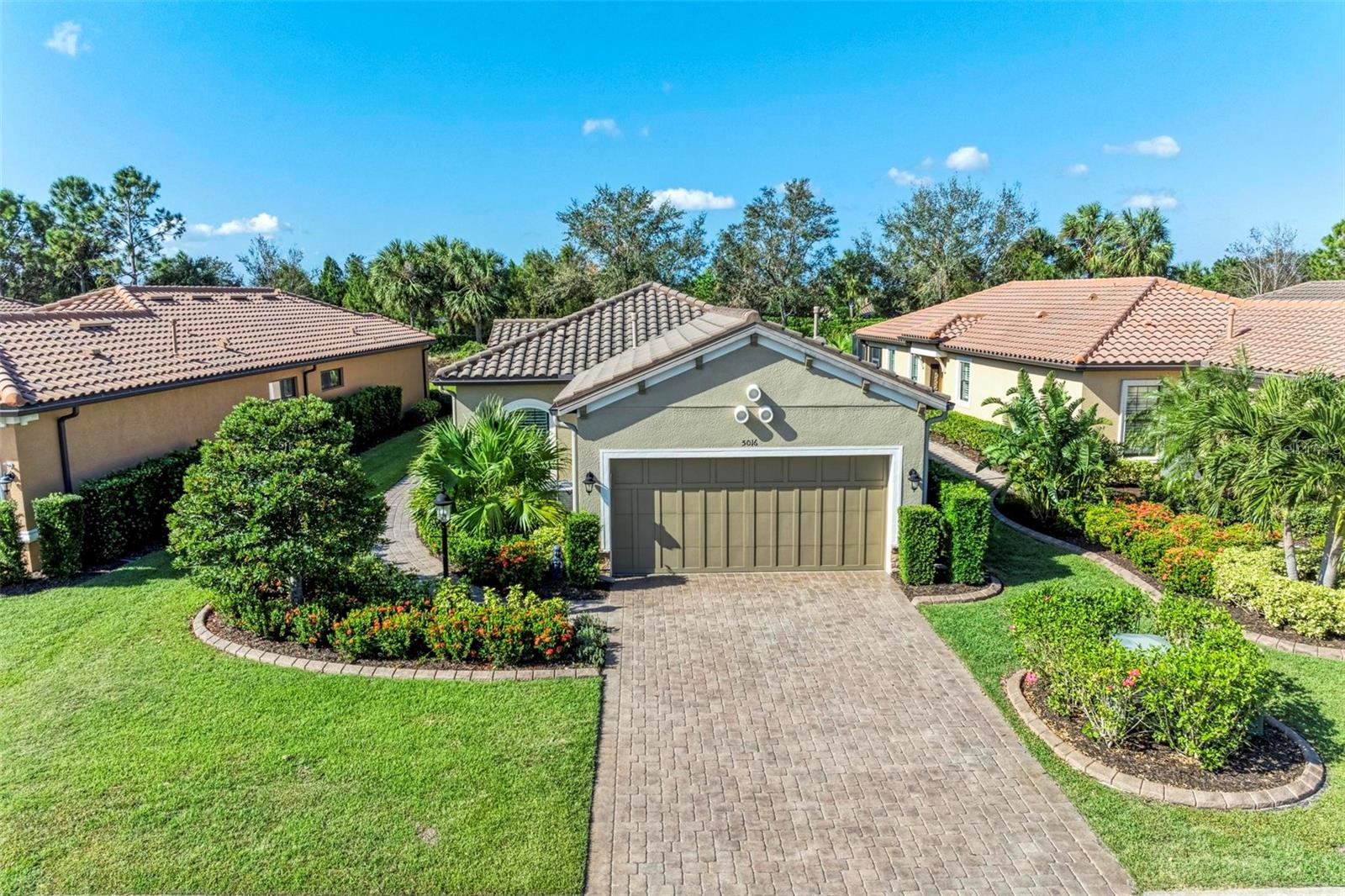 HUGE PRICE IMPROVEMENT--SELLER MOTIVATED!!! PRIVATE GOLF (PAY TO PLAY)!! Amazing opportunity in the heart of Lakewood Ranch at Esplanade Golf & Country Club community. This Taylor Morrison’s Roma floor plan is spacious and convenient. It offers 2 bedrooms, 2 baths, plus den/study in a detached villa floor plan. Upon arrival, very visible is the maintenance-included lush landscaping that is accented with custom curbing to complement the paver driveway and side entryway. Step inside this lovely home to find meaningful upgrades beyond the builder’s standard options. There is no carpet throughout the home. Luxury vinyl plank extends to all the living areas except the master bedroom and study which share a laminate surface. The kitchen peninsular has been remodeled and lowered to counter height seating instead of bar height for those informal meals. It features a quartz surface with a single bowl Blanco granite composite sink. The kitchen is on an exterior wall of the home with a perfectly placed center window that allows lots of natural light while preparing meals. There is ample storage in the kitchen with extra upper and lower cabinets. The primary bedroom is tucked away in the rear of the home which has a custom walk-in closet and a private bathroom with pocket-door access. The primary bathroom dual-sink vanities are comfort-height with extra storage drawers. The stepdown walk-in shower has been outfitted with frameless glass shower doors to give it a clean and sleek look. The other bedroom sits to the front of the home with a custom finished walk-in closet. There is pocket-door access to the second bedroom that offer En suite use of the updated second bathroom. For quiet time the den/study has pocket door access & a high picture window to create a tranquil reading or meditation room. There is end-to-end built-in shelving to store your favorite novels. The finished laundry room has extra cabinet storage to meet your needs! Other interior updates include crown molding in the main living areas, plantation shutters, & ceiling fans. Updates that extend beyond the interior of the home include a whole home HALO WATER FILTRATION & conditioning system, rain gutters for proper drainage, extended screened paver lanai with retractable awning to provide additional shade outdoors, and Storm Smart slide screens that allow hurricane protection that is easy to install and store—no more hassles with aluminum shutters. Furnishings are optional. Included is a transferable Home Warranty. Esplanade offers something for everyone looking for luxury resort living! With an amenity rich resort lifestyle there is a monthly social and activity calendar, on-site lifestyle director, social events, & social clubs. Enjoy a round of golf on the 18-hole championship golf course, or enjoy other activities such as tennis, pickleball, & bocce ball. There are 2 clubhouse facilities equipped with fitness center, exercise classes, spa/salon, firepit areas, dog parks, and kayak launch. Grab a casual bite at the pool side Bahama Bar or visit the Barrel House for dinner at the Culinary Center which has wine tastings, catering services & special events. Come discover Esplanade and make this picturesque amenity-rich gated golf community your perfect seasonal retreat or year-round home. Close to I75, UTC Mall shopping, medical facilities, downtown Lakewood Ranch, Bradenton, Sarasota, & fantastic Gulf beaches of Anna Maria Island. Schedule your showing today!!