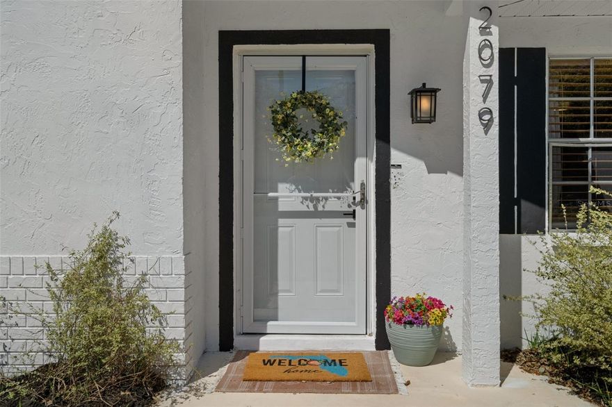 Welcome to this charming 2-bedroom, 2-bath home offering comfort, flexibility, and a great outdoor lifestyle! Situated on a spacious quarter-acre corner lot, this property features a 1-car garage plus an additional carport—complete with an outlet for electric vehicle charging—providing both convenience and modern functionality. Inside, you’ll find a functional layout with living room connected to the kitchen and dining space, vinyl plank flooring throughout and stunning natural light. The primary suite offers ample space, with a closet in the bedroom, as well as an additional large walk-in closet, located in the bathroom. The primary bath has tile floors, a tiled walk-in shower and oversized vanity for extra storage. Off the hallway, you will find an updated second bathroom with a tiled tub/shower combo, new vanity and wood tile flooring. The second bedroom offers a unique bonus space—perfect for a home office, nursery, or an oversized closet. The kitchen is in the heart of the home, overlooks the backyard oasis and includes stainless steel appliances, stylish open shelving, copper backsplash and a pantry! The home also features a versatile Florida room —ideal for use as a second living area, formal dining space, home office, playroom, home school room or even a potential guest room. Step outside to enjoy a fully fenced backyard with a play set, shed and is complete with a patio space perfect for a fire pit, grilling, relaxing or entertaining. The yard also features mature landscaping, including a producing olive tree and established grapevine—adding both charm and character to your outdoor space. Home is on septic and public water but has a well for the irrigation system, so you can benefit from adding more plants, fruit trees or a garden space! No HOA, Non flood zone, HVAC 2024, Water heater 2023, Roof 2012. This house is conveniently located near dining, shopping, medical, and schools. Also in close proximity to Nature Coast Botanical Gardens, Weeki Wachee Springs State Park, and SunWest Park for easy access to some of the area’s most popular outdoor attractions. Whether you’re looking for a primary residence, seasonal getaway, or investment opportunity, this home offers a fantastic blend of comfort, location, and value.