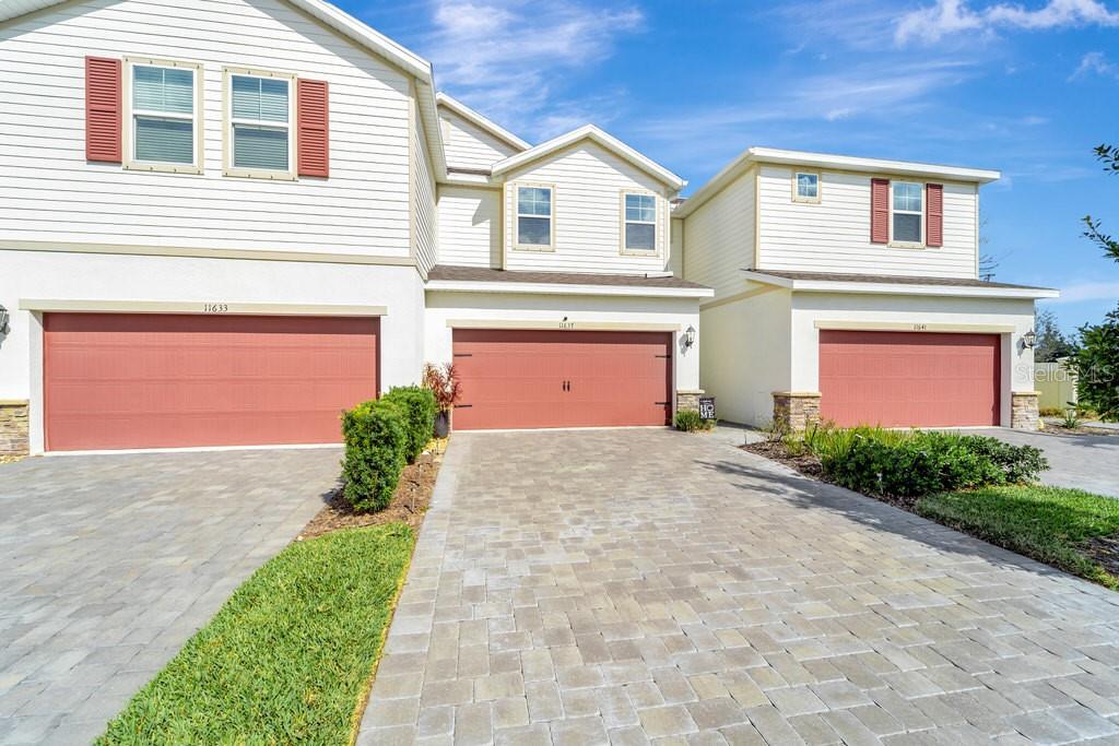 Discover the perfect blend of luxury and convenience in this beautiful townhouse condominium nestled in the sought-after Woodleaf Hammock neighborhood of Lakewood Ranch. Located in a gated community, this home offers resort-style amenities, including a sparkling community pool, covered pavilion, pickleball courts, two dog parks, and a tot lot—all designed to help you live the good life.
This spacious three-bedroom townhouse features a primary suite with double walk-in closets, providing ample storage and a private retreat. The beautifully appointed kitchen boasts modern upgrades and premium finishes, making it a chef’s dream. Throughout the home, you’ll find high-end upgrades, ensuring style and comfort in every corner.
Enjoy Florida’s beautiful weather year-round in the screened-in lanai, perfect for relaxing or entertaining guests. Storage is never an issue with a two-car garage with plenty of interior storage space.
Conveniently located with quick access to I-75, top-rated schools, shopping, dining, and entertainment, this home offers the ideal combination of tranquility and accessibility.
Don’t miss the opportunity to make this incredible townhouse your own!