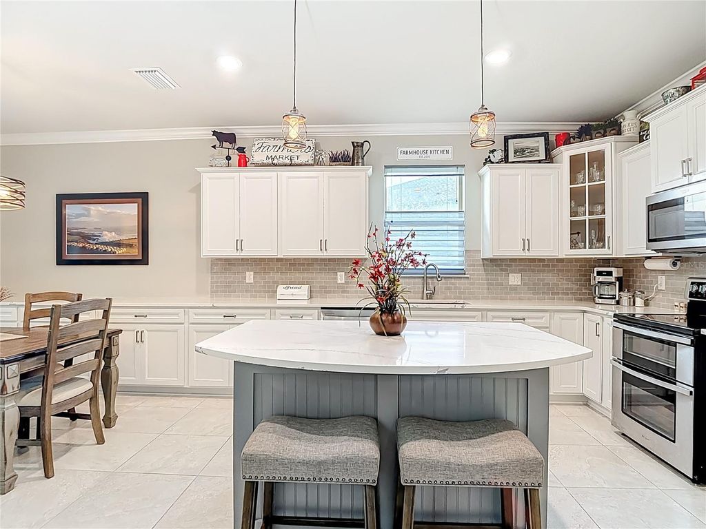 Photo of 12629 Palapa Loop, Spring Hill, FL 34610 (MLS # TB8485830)