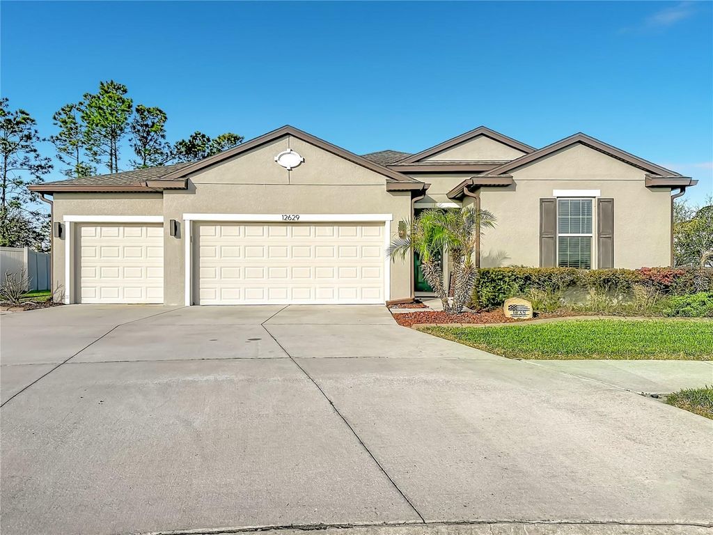 Photo of 12629 Palapa Loop, Spring Hill, FL 34610 (MLS # TB8485830)