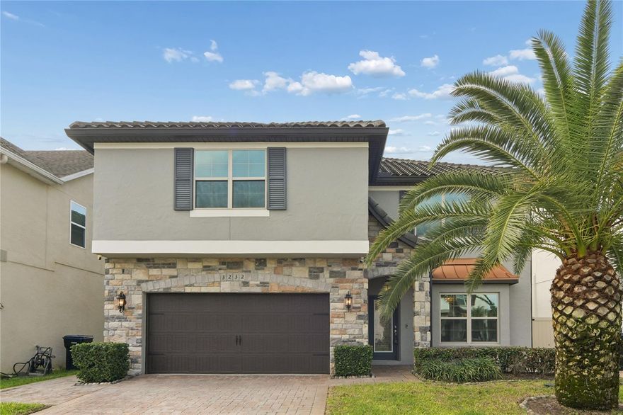 Located in the sought-after Lake Preserve community of Orlando, this lovely, well-maintained home features the Astoria Plan C floor plan by Meritage Homes and is ready for a new homeowner. The Mediterranean-style clubhouse, pool, community dock, splash pad, and cabana create an elevated, private island-style feel. A pet-walking and bike-friendly neighborhood. The home features a brick driveway, stone exterior, and tile roof, offering a strong sense of curb appeal. This split two-story home offers a guest bedroom and full bath downstairs, and three additional bedrooms upstairs. The primary suite includes an extended flex space ideal for a nursery or quaint reading nook. A Jack and Jill bathroom connects two secondary bedrooms. It includes a private room off the entrance that can be used as a luxury dining room, fun game room, home office, or staged library. The open kitchen offers a gas cooktop and, along with the living room, creates a warm, social layout. Sliding glass doors lead to a fully screened, paved lanai, ideal for soaking up the sun or entertaining around a fire pit. Conveniently located minutes from Lake Nona, St. Cloud, Kissimmee, Medical City, and 417.