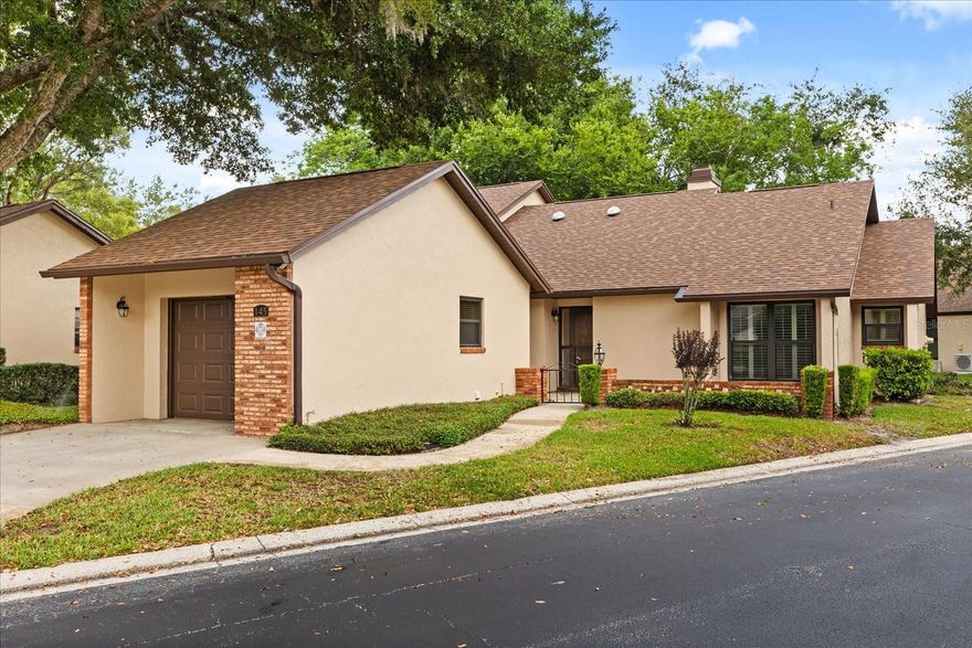 Tucked away in the heart of Wekiva Golf Club, this beautifully maintained end-unit residence offers the perfect blend of comfort, charm, and tranquility within one of the area’s most peaceful and well-kept communities. From the moment you arrive, you’ll appreciate the private front courtyard entry — an inviting outdoor space perfect for morning coffee, quiet evenings, or welcoming guests.

Inside, soaring vaulted ceilings and an abundance of natural light create an open, airy feel throughout the home, while the fireplace adds warmth and character to the main living space. Thoughtful upgrades include top-of-the-line windows paired with elegant plantation shutters, enhancing both style and energy efficiency.

Major improvements have already been completed for peace of mind, including a brand-new roof (2024), newer A/C (2021), and fresh exterior paint completed in 2026. As an end unit, the home offers added privacy and a more spacious feel rarely found in similar properties.

Surrounded by mature landscaping and nestled within a serene golf community setting, this home offers a rare opportunity to enjoy low-maintenance living in a quiet, tranquil neighborhood while still being conveniently close to shopping, dining, parks, and everything Central Florida has to offer.