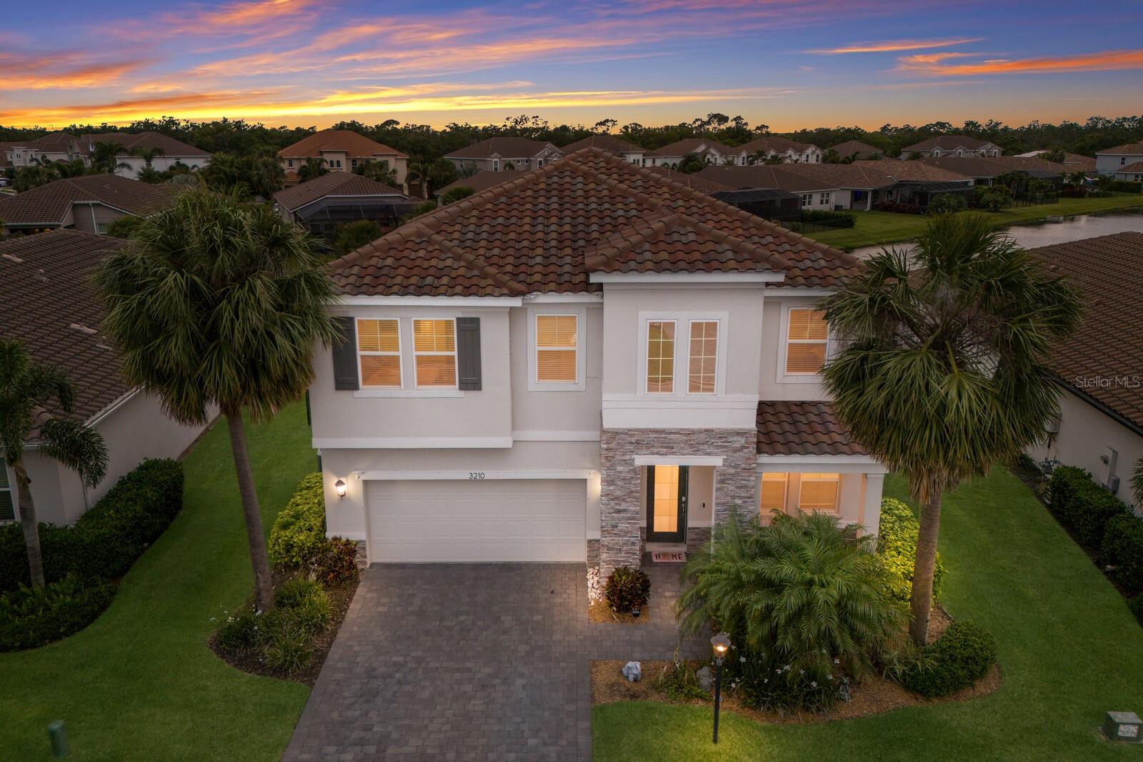 Your DREAM home awaits!!! This 4 bedroom, 2.5 bath Florentine model by Meritage offers 2,641 sq. ft. of well designed living space in the highly sought after community of Savanna in Lakewood Ranch. As you step inside, you’re greeted by a SPACIOUS den/office with double French doors which is perfect for working from home or creating a quiet reading space. The open concept kitchen and living room combo is ideal for entertaining, featuring stainless steel appliances, a walk-in pantry, tile backsplash, QUARTZ countertops and a kitchen island with eat-in space. Just off the kitchen is a dedicated dining area with sliders that open to the TRANQUIL backyard, creating a seamless indoor/outdoor flow. A convenient half bath is located downstairs for guests. Upstairs, enjoy the versatility of a generous LOFT which can be used as a media room, game room, or additional lounge area for family and friends. The spacious owner’s suite includes a WALK-IN closet and a LUXURIOUS ensuite bathroom with dual sinks and a walk-in glass shower. Three additional bedrooms share a full bathroom with dual sinks and a tub/shower combo. For added convenience, the laundry room is located upstairs and includes a recently updated washing machine. Unwind after a long day on the covered patio overlooking a PEACEFUL pond view and a fully FENCED, oversized backyard offering endless possibilities for a future pool or plenty of room for family and pets to play. Additional highlights include ultraviolet lights in the A/C system to help prevent mold, adding an extra layer of comfort and peace of mind. This home truly has it all...space, function, and LOCATION!! Savanna offers LOW HOA resort-style amenities such as a clubhouse, swimming pool, state-of-the-art fitness center, basketball courts, playground, dog park and numerous walking paths. Lakewood Ranch is known for their A+ rated school system and is perfectly located just a short ride to downtown Sarasota, St. Pete, world class shopping, fine dining and the FAMOUS Gulf beaches! Don't wait to make this your home and begin your FLORIDA Lifestyle!