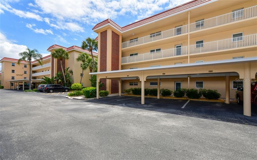 Immaculate End Unit in the Marlin building, Ready for you to Enjoy through January 2026 and April 2026 through year-end 2026! Stunning all the way, Great Location in the complex, close to the pool, clubhouse, spa, sauna, 2 bedroom 2 full baths, enclosed lanai overlooking the canal, steps to Deeded beach access through Crescent Arms, for your pleasure daytime or sunset time! Siesta Harbor offers a heated pool, outdoor jacuzzi, indoor sauna, fitness room, newly surfaced shuffleboard court, great clubhouse to enjoy the beautifully decorated main room, kitchen with barbecue area, library, Siesta Harbor is located directly on the main intracoastal waterway and has a dock with seating for your enjoyment to watch the boats going by, a little fishing or relaxing! The Trolley and Scat right at our doorstep and walk to shops, restaurants beach, all for you to enjoy in Paradise! Open Floor Plan, enclosed lanai, dining area open to the living room, lots of windows since this is an end unit. Beautiful water views of the canal. Two bedroom, two bathroom and beautiful flooring throughout. Come to our Paradise! Siesta Harbor is surrounded by the Intracoastal Waterway with Harbor and Bay views from every unit. This South facing renovated condo is in the building closest to the pool, and you have your own assigned parking space. Sit on your lanai and watch the boats go by as you sip your morning coffee. Amenities include direct beach access to Siesta Key beach, voted the number One beach in the USA, community pool and spa, sauna, fitness room, newly surfaced shuffleboard court and walking distance to shops, restaurants and entertainment. Close proximity to the Stickney Point bridge enables easy access on and off the Key. This is a 55+ community which means one renter in the party must be over 55 years of age. No pets and no smoking please.