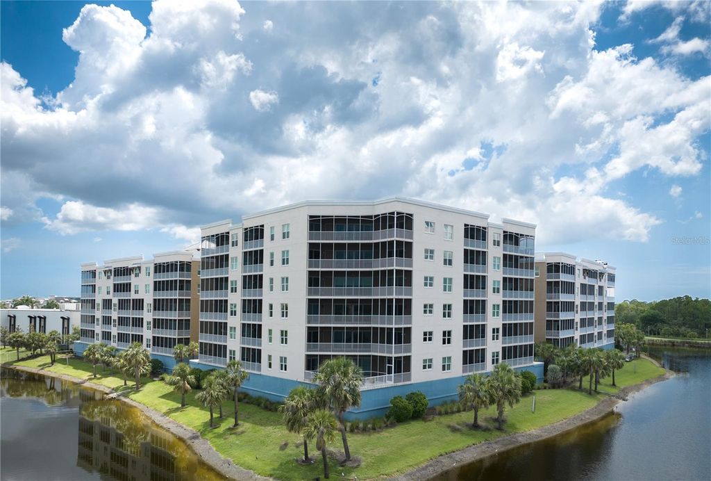 Photo of 10520 Boardwalk Loop #202, Bradenton, FL 34202 (MLS # TB8398619)