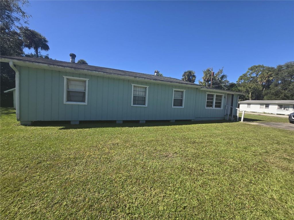 Photo of 171 N Putnam Grove Road, Oak Hill, FL 32759 (MLS # O6357141)
