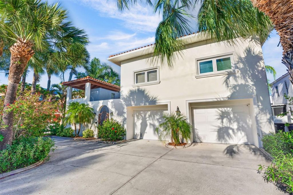 Photo of 831 Mandalay Avenue, Clearwater Beach, FL 33767 (MLS # TB8509543)