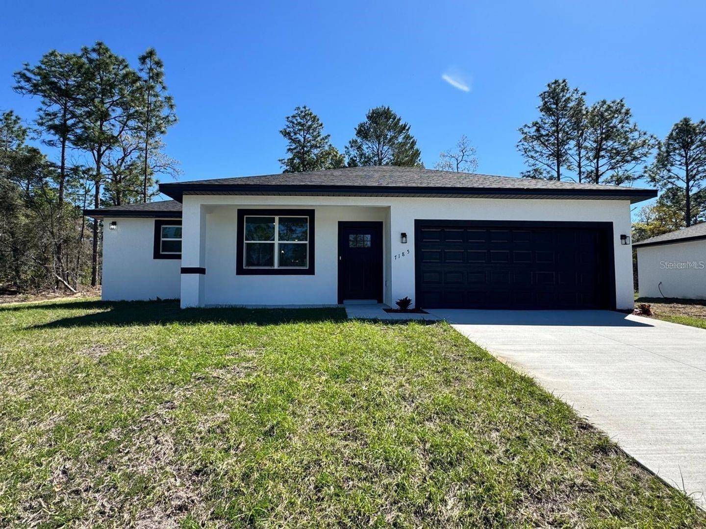 This is a newly built, contemporary 4-bedroom, 2-bathroom home with numerous upgrades. The entire house is outfitted with tile flooring, including in the large bedrooms. The kitchen features a central island and beautiful granite countertops, which are also present in the bathrooms, paired with stylish wall tiles. The home comes fully equipped with stainless steel appliances, including a microwave, dishwasher, refrigerator, and stove. Don't let this incredible opportunity slip away!