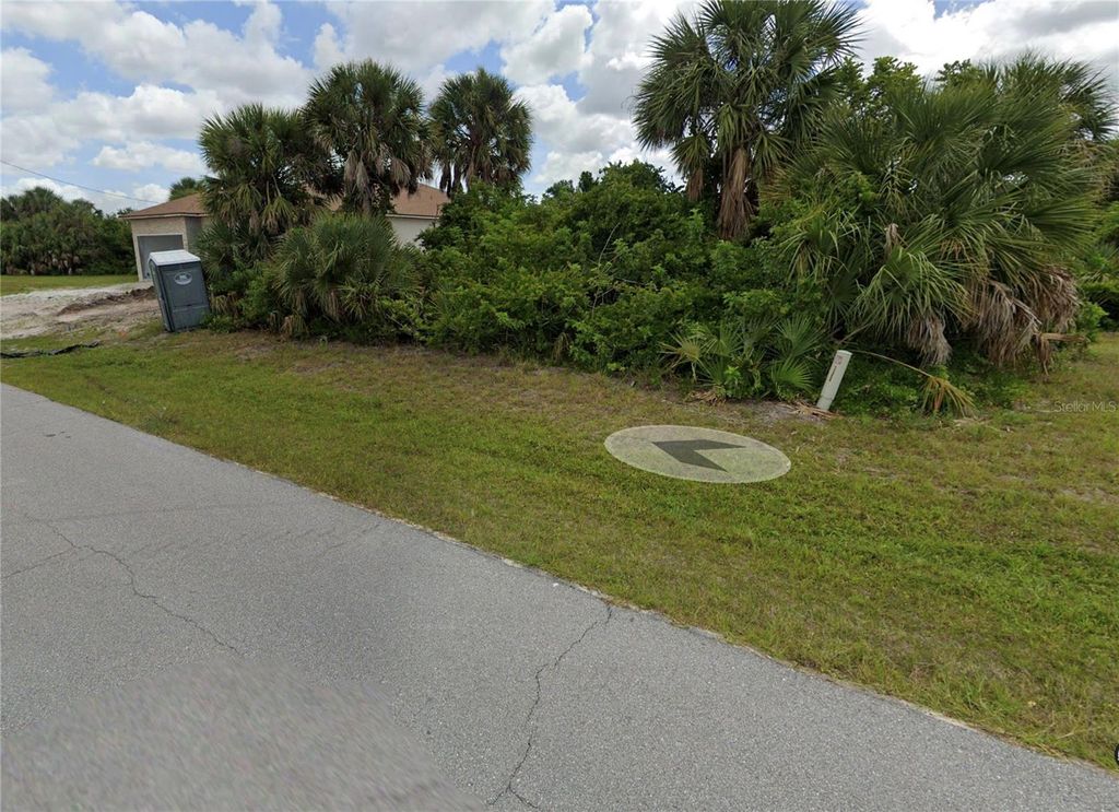 Photo of 146 Spring Drive, Rotonda West, FL 33947 (MLS # O6387205)