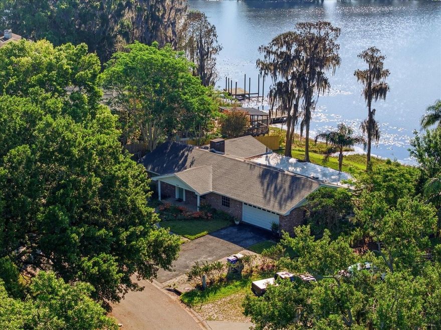 Welcome to life on North Crystal Lake in Lutz — a private 40-acre lake where days are spent enjoying boating, fishing, paddleboarding, and taking in peaceful waterfront views, all just minutes from downtown and convenient access to the Veterans Expressway.
Set along the shoreline, this property offers a rare blend of tranquility and accessibility, allowing you to enjoy true lakefront living without sacrificing proximity to Tampa’s key destinations. Expansive water views create a stunning backdrop, visible from nearly every room and designed to be experienced both inside and out.
The ranch-style home features 3 spacious bedrooms and 2.5 baths, with updated tile flooring throughout most of the living areas. The updated kitchen includes a breakfast bar ideal for casual dining and entertaining, while a separate dining room provides additional space for gatherings. The expansive great room is filled with natural light and positioned to capture the full beauty of the lake.
Step outside to a massive screened-in patio — the perfect place to relax, entertain, and enjoy year-round waterfront living. Additional features include a large laundry and storage room and the added benefit of no HOA.
A rare opportunity to secure a true lakefront lifestyle on North Crystal Lake, combining scenic beauty, usable space, and unbeatable convenience.