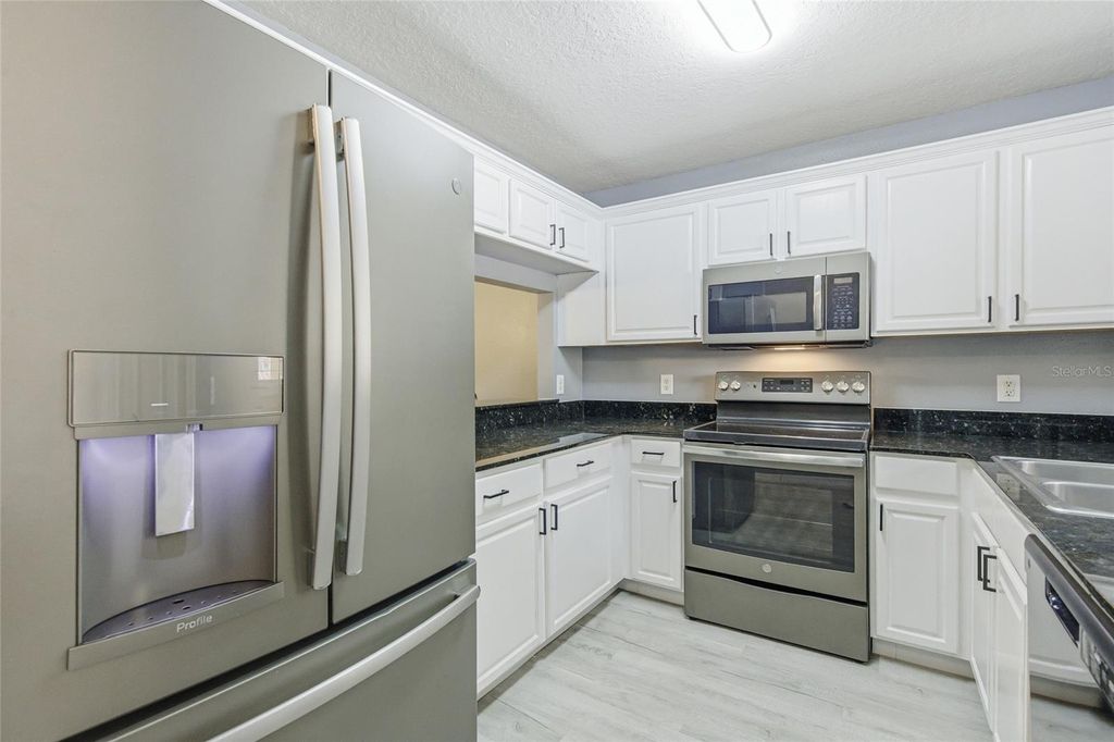 Photo of 208 Dragons Fire Place, Valrico, FL 33594 (MLS # TB8439370)