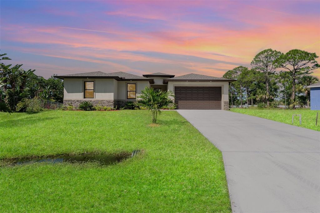 Photo of 3187 Topsey Avenue SE, Palm Bay, FL 32909 (MLS # O6350472)