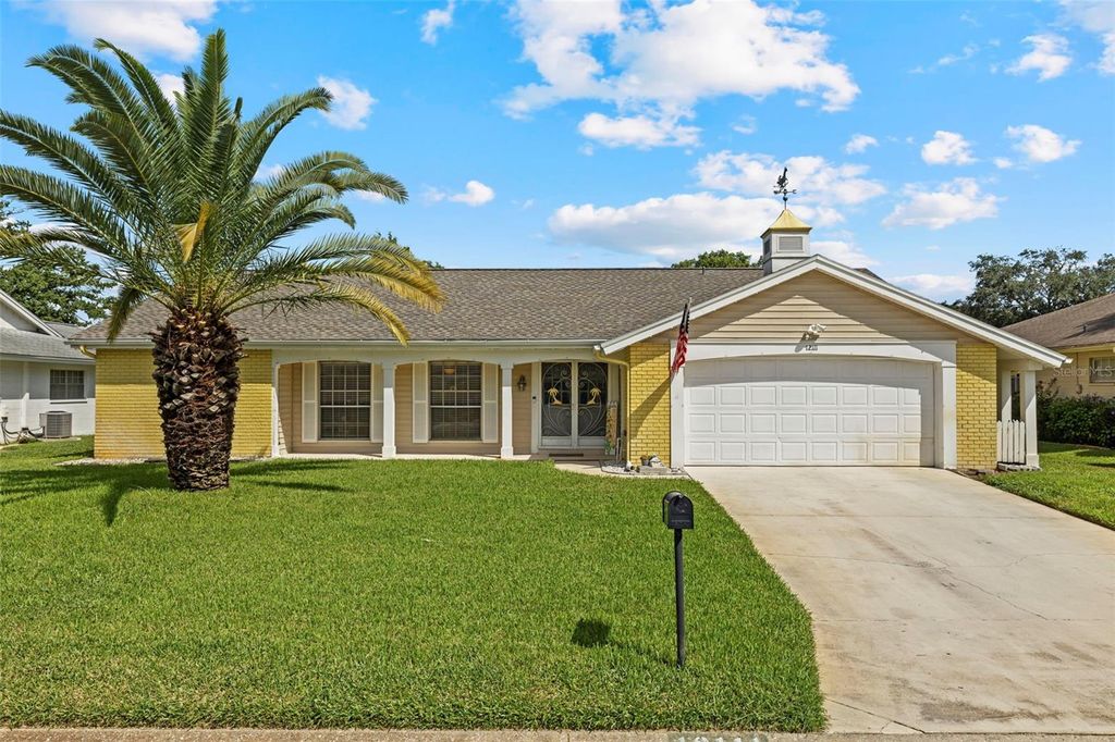 Photo of 12111 Fieldstone Lane, Hudson, FL 34667 (MLS # TB8421273)