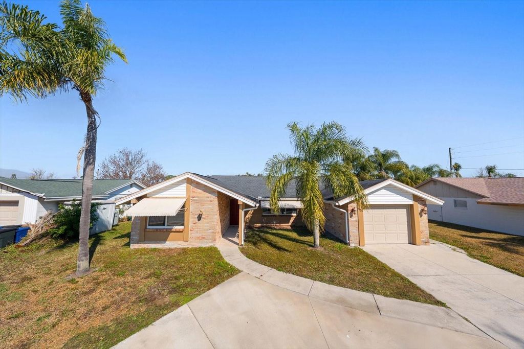 Photo of 4025 Sail Drive, New Port Richey, FL 34652 (MLS # TB8474132)