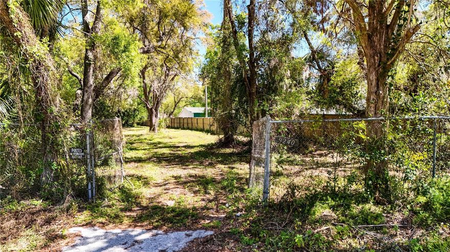 Are you searching for a vacant 1+ acre property within New Port Richey?  Come to see what Bass Lake Acres has for you.  This property was made up of 3 parcels and combined to make a nice 1.55 piece of land ready for your vision.  The property has a 220 sq ft front entrance.  While the property is located within a subdivision; there is NO HOA or CDD fees and new single family homes are being built within to increase values.  This lot previously had a 1,400 sq ft home that has been removed (by permit) and the slab and foundation remain.  There is also a well and septic onsite that have been capped and power is easily accessible.   This property is minutes to Lowes, restaurants, Pasco-Hernando State College and more!  Property is being sold AS IS and Buyer is to do their own due diligence.  Paving Assessment has been paid in full.
Zoned R-2 - which means you can subdivide this property to make several units.