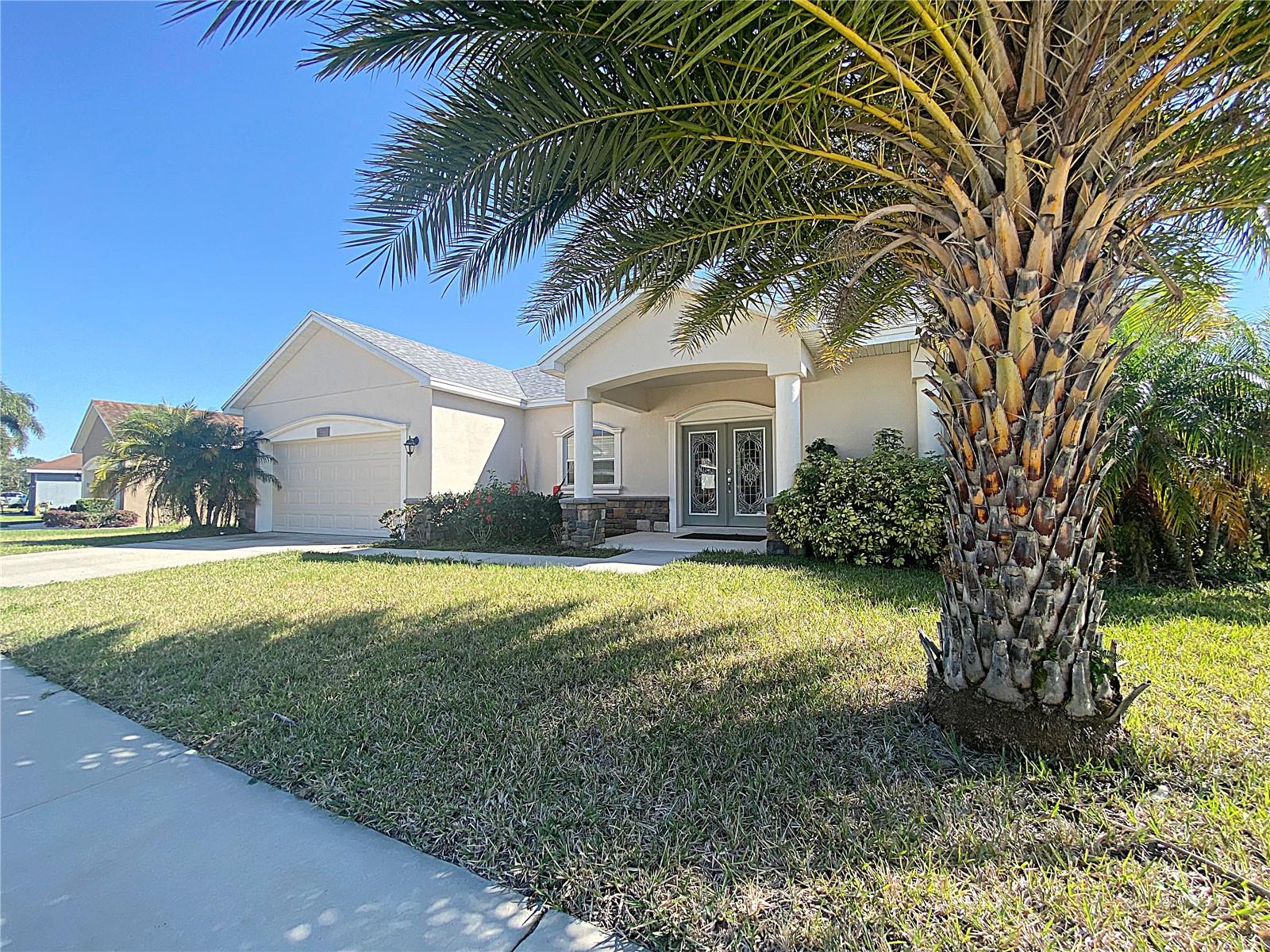 Update...small pet permitted! 4 bedroom, 2 bath lakefront home in the highly desirable, gated Mandolin community! Welcome to 4311 Mandolin Blvd! As you enter the decorative glass double doors you are welcomed into the open, formal living and dining rooms. Featuring a tray ceiling and accent wall the formal dining room is conveniently located adjacent to the kitchen. The kitchen comes fully-equipped with a stainless steel appliance package including refrigerator, range, microwave, and dishwasher. It also offers granite countertops, ample storage space, and breakfast bar with pendant lights. Beyond the breakfast bar is the great room and an additional dining area with access to the screened lanai. On the west side of the home is the master suite featuring a decorative tray ceiling, access to the lanai, and en-suite bathroom with shower stall, garden tub, dual sinks, water closet, and walk-in closet. The split bedroom plan situates the additional three bedrooms on the opposite side of the home along with the guest bathroom. While the inside amenities are many, the lanai, views of the lake, and lake frontage really put this property over the top. Additional features of this magnificent home include a 2-car garage, inside laundry room, ceiling fans throughout, granite countertops, and well-maintained landscaping. Sorry – no smoking!
