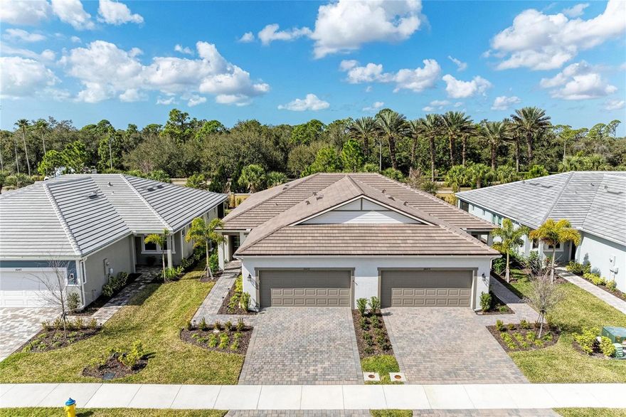 Price reduced, new photos added for this conveniently located move in Ready Villa lightly used with nicely appointed fixtures, and window treatments. Live the Florida lifestyle in this paired villa in Renaissance at West Villages by Mattamy Homes. Perfect for seasonal or year-round living, this 1,507 sq. ft. open-floor plan offers a blend of comfort and style, including 2 bedrooms, 2 bathrooms, a private study, laundry room, and a 2-car garage. The large kitchen is at the center of your living space and features standout Carrara Breve quartz countertops, 42" upper cabinets, a large center island that seats 3, stainless steel appliances, and a large pantry. The kitchen flows seamlessly into the living and dining areas, making it ideal for both everyday life and entertaining. The owner's suite offers a luxurious bath with a dual sink raised vanity, private toilet, and a spacious walk-in closet. The secondary bedroom is perfect for family and friends. The private study provides additional space for work, relaxation, or leisure. This villa is equipped with a Smart Home package, including a Wi-Fi-capable garage door opener, Ecobee Smart Thermostat, electronic smart lock, and more. Located within the resort-style Renaissance community, residents enjoy an active lifestyle with amenities that include pickleball, tennis, a pool and clubhouse. Schedule your showing today and make this home yours!