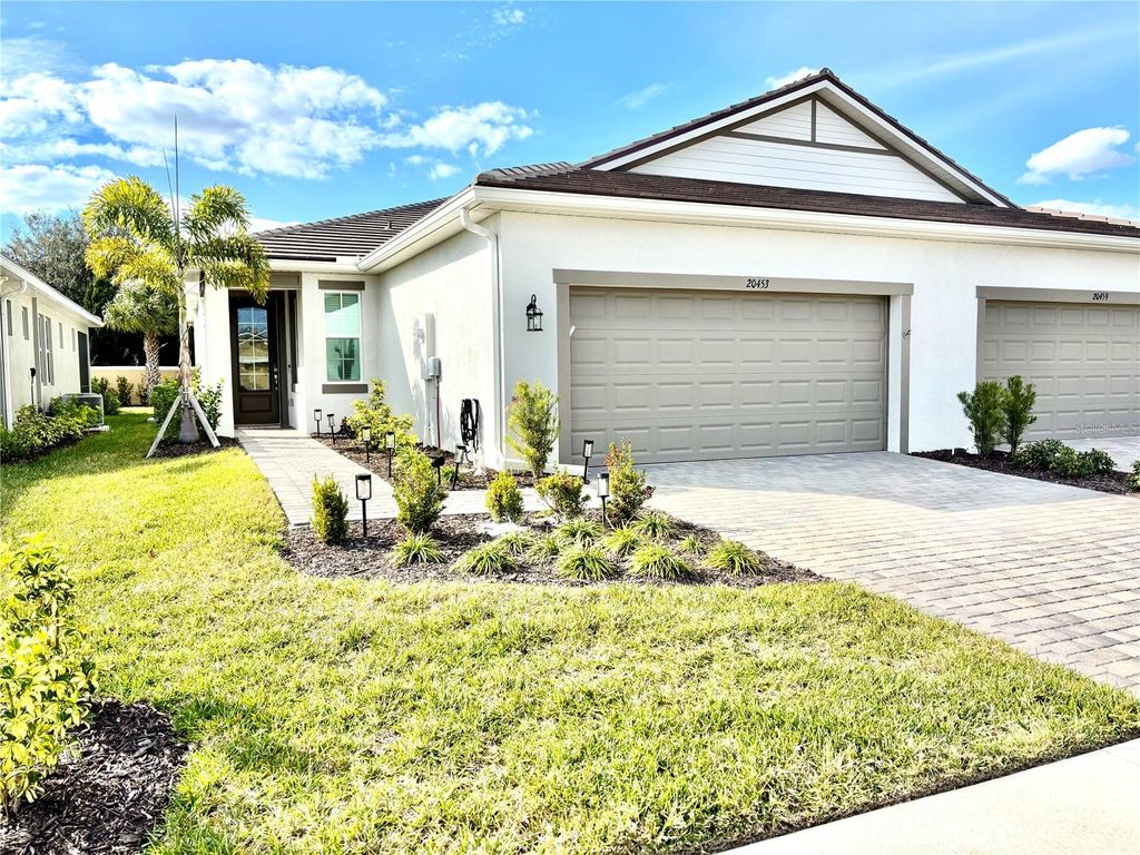 Photo of 20453 Symphony Place, Venice, FL 34293 (MLS # A4679314)