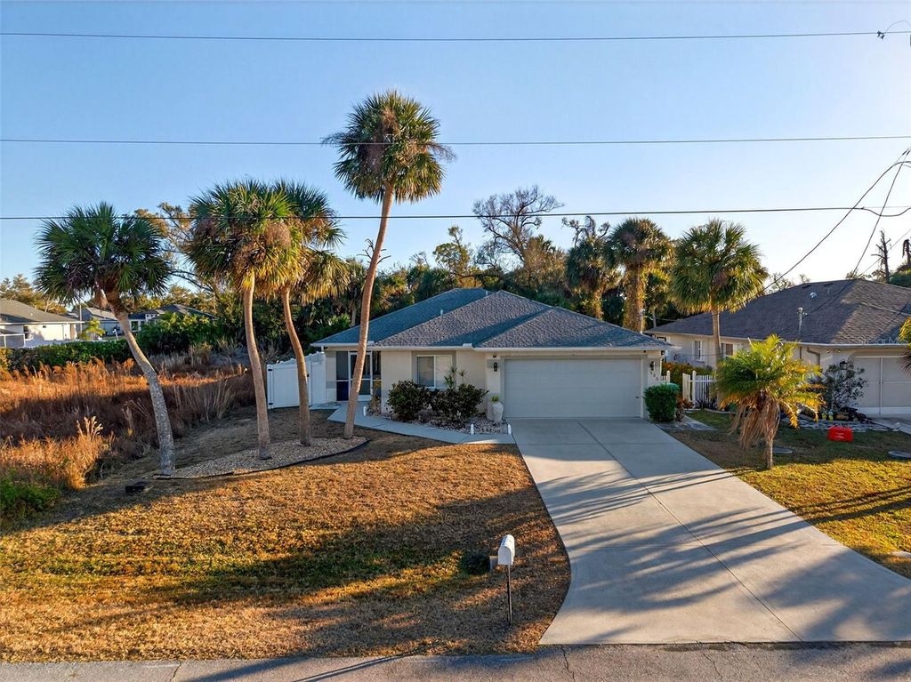 Photo of 125 Spur Drive, Rotonda West, FL 33947 (MLS # A4682446)