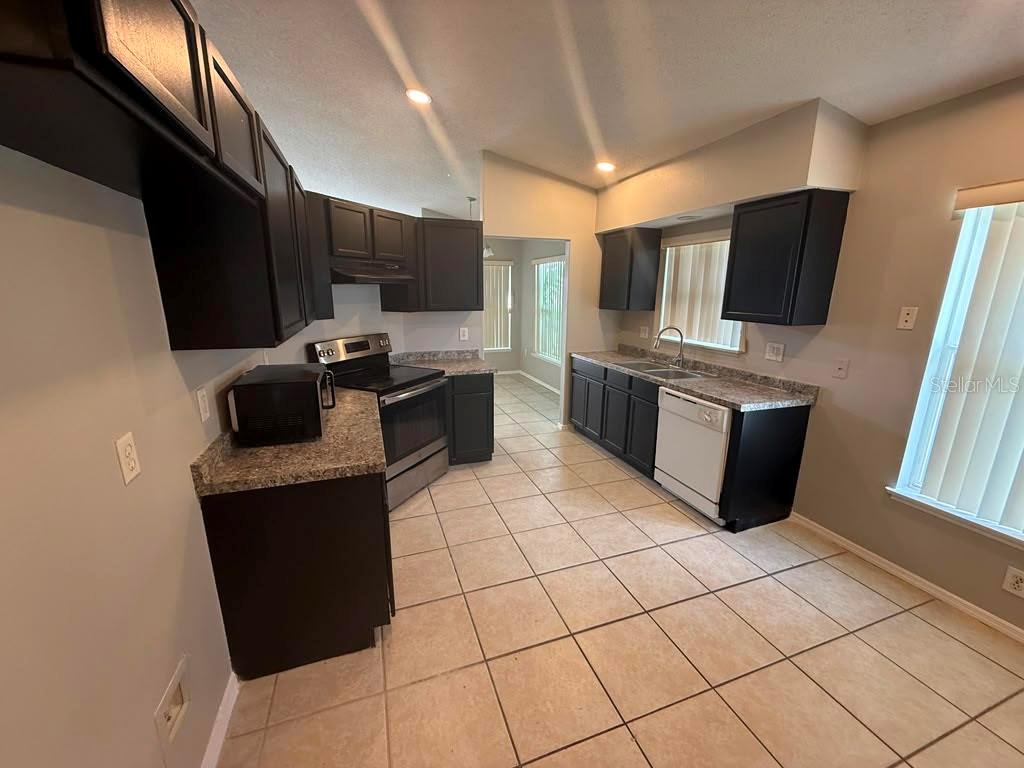 Photo of 1440 Timberbend Circle, Orlando, FL 32824 (MLS # O6420114)