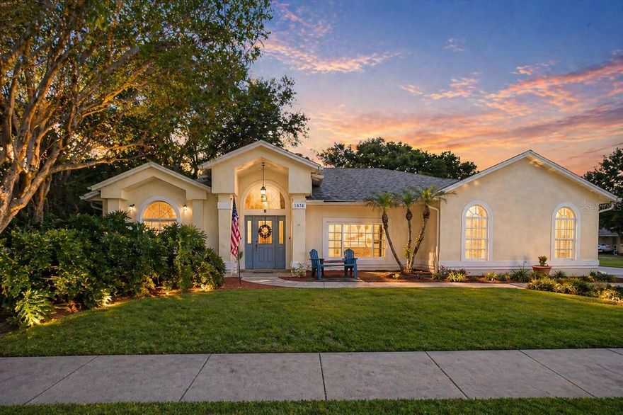 One or more photo(s) has been virtually staged. Peaceful Lake View, No Rear Neighbors & a Private Office Entrance

Unwind each evening with a breathtaking sunset lake view and no rear neighbors—your own private retreat right at home. A rare find, this 5-bedroom home features a private entrance office, perfect for working from home, guests, or multi-generational living.

Located in desirable Brighton Park at Carillon, this beautifully maintained 5-bedroom, 2.5-bath home offers nearly 2,300 sq. ft. of thoughtfully designed living space, zoned for top-rated Carillon Elementary and Hagerty High School, both just minutes away.

Enjoy peaceful water views from your screened lanai, creating the perfect setting for relaxing mornings or evening gatherings.

Inside, you’ll find wood-style flooring, a light-filled kitchen with skylight, Corian countertops, custom pull-out cabinetry, and a welcoming living space featuring built-in shelving, a large sliding glass door, and remote-controlled shades.

The flexible fifth bedroom serves beautifully as a private office with its own separate entrance, offering a unique opportunity for privacy, productivity, or guest accommodations.

KEY FEATURES & UPDATES: New Roof (2024), Double-Pane Windows (2023), Updated Electrical (2025), Gutter Covers (2025), Remote-Controlled Shades, Power Garage Screen.

COMMUNITY AMENITIES: Tennis courts, parks and playgrounds, ball field, sand volleyball court, lake maintenance included.
Conveniently located near UCF, shopping, dining, and major roadways, this home offers the ideal balance of privacy, flexibility, and convenience.

Homes with this combination of lake views, no rear neighbors, and a private entrance office are rare—schedule your private showing today.