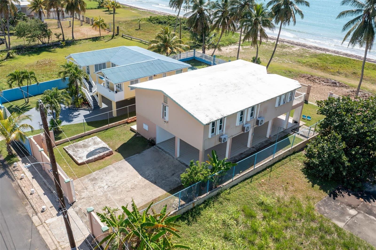 Beach Front House for Sale: Cielo y Mar 21
Beautiful Beachfront Property in Punta Santiago, Humacao, Puerto Rico
Welcome to "Cielo y Mar 21", an exquisite 1844 SQFT beachfront house located at Calle Lobina in Punta Santiago, Humacao, Puerto Rico. This stunning property offers an unparalleled view of the Caribbean Sea and Vieques Island, making it the perfect retreat for those seeking tranquility and beauty.
Property Details
• Location: Calle Lobina, Punta Santiago, Humacao, Puerto Rico
• Size: 1844 SQFT
• Bedrooms: 2 (on the second floor)
• Bathrooms: 2 (on the second floor)
• Additional Unit: Separate studio unit with a full bathroom and an equipped kitchen (on the first floor)
• Amenities: Shutters, A/C in all rooms, huge kitchen with ocean view, high ceilings
Amenities and Features
Cielo y Mar 21 is a two-story haven designed with comfort and elegance in mind. The second floor houses two bedrooms, each equipped with high ceilings, ensuring a spacious and airy environment. The ground floor features a separate studio unit complete with a full bathroom and a fully equipped kitchen, perfect for guests or potential rental opportunities.
Living Spaces
The main living area is adorned with large windows offering breathtaking ocean views, filling the space with natural light and the soothing sounds of the sea. The expansive kitchen is a chef's dream, providing ample space for culinary adventures while enjoying panoramic ocean vistas.
Outdoor Experience
The exterior of Cielo y Mar 21 is designed to embrace its beachfront location, with easy access to the shore and stunning views of Vieques Island. The property is equipped with shutters for added security and peace of mind.
Neighborhood and Location
Punta Santiago is a vibrant community with convenient access to local amenities. Within close proximity, you'll find restaurants, a supermarket, a pharmacy, a fishing dock, and a natural preserve. The house is only a 30-minute drive from the ferry terminal to Vieques and Culebra islands, and about 45 minutes from the bustling city of San Juan.
Investment Opportunity
Cielo y Mar 21 is not only an ideal vacation home but also a lucrative rental property. Its prime location and exceptional features make it a sought-after destination for tourists and vacationers alike.
Don’t miss this incredible opportunity to own a piece of paradise in Punta Santiago. Contact us today to schedule a viewing and experience the magic of Cielo y Mar 21.