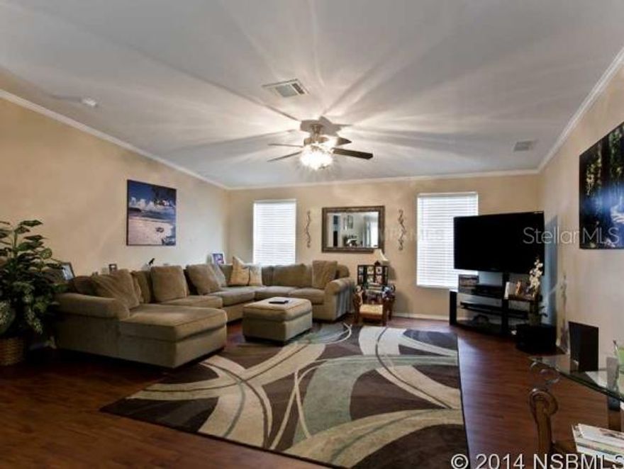 Completely updated, spacious, bright home on 5 + acres! The builder of this manufactured/modular home is one of the most popular & advanced manf. Home builders in the country! This Palm Harbor Homes, Darlington model has been finished in drywall with light texture, high ceilings,designer light fixtures. Interior has been freshly painted,kitchen galore features a large center island,lots of cabinetry, range, dishwasher, microwave hood. The living /dining has plenty of windows with natural light flowing through out. Master suite is a true delight, offering separate sitting room or office, high ceilings, oversized master bath with "his"&"her" sinks, garden bath, separate shower stall & large walk in closet. The secondary bedrooms with full bath are located on opposite side of the home providing full privacy. The following updates have been done: 5/2013 new drill well with updated water softener & chlorinator, 6/2013 press. treated oversized front porch, 2013 updated blind package for  windows, 10/2013 AC system serviced, home is covered under TERMINIX Termite bond was inspected 10/2013. (transferable to Buyer). The property is perfect for horses or other critters 1 + acre fenced run with pond (fully maintained), pole barn & metal shed for feed is on the property ready for new occupants. There is main entry gate to provide privacy also motion sensor lighting, crushed concrete driveway with lots of parking & much more! As of 10/2013_School Zoning: Geneva Elem., Chiles Mid., Oviedo High.