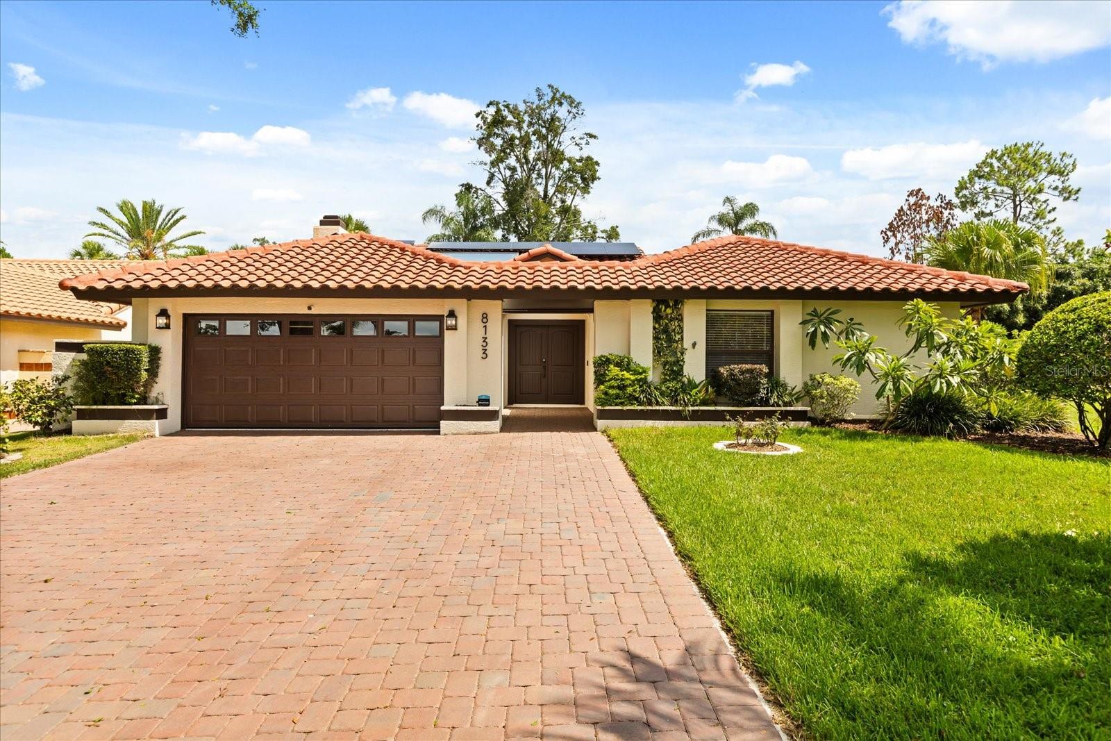 One or more photo(s) has been virtually staged. Completely Remodeled Showstopper in Granada Villas – Minutes from Restaurant Row!
Welcome to this exquisitely renovated 3-bedroom, 3-bath home offering 1,823 square feet of stylish, modern living in the heart of Orlando’s sought-after Granada Villas. Every inch of this home has been thoughtfully reimagined with top-quality finishes and designer details, making it truly move-in ready.
Step inside to discover an open, bright layout with brand-new tile flooring throughout, wood ceilings in the family room and kitchen, and a remodeled fireplace with custom tile and woodwork from floor to ceiling. The fully redesigned kitchen is a chef’s dream, featuring custom cabinetry, quartz countertops, a 60-inch ZLINE fridge, upgraded appliances, —plus a built-in coffee bar with sink, trash storage, and shelving.
Each bathroom was gutted and upgraded with high-end materials, including a steam shower and built-in laundry in the luxurious primary bath. Custom closets were added to all bedrooms for maximum organization and space.
Enjoy Florida living at its finest in the newly resurfaced pool area, complete with a wood ceiling covered lanai, outdoor kitchen, three outdoor TVs, and a high-end Hayward pool system allowing remote control of pool heat, lighting, solar panels and more. Other notable upgrades include:
* New paver driveway
* New front and garage doors
* Epoxy-coated garage floor and custom storage
* Expanded electrical system
* New lighting and house numbers
* Oversized lot offering room for expansion- HOA covers lawn maintenance
Community Perks: Granada Villas residents enjoy access to tennis courts and a private boat ramp on Little Sand Lake. You’re also just steps from Trader Joe’s and over 75 dining options on famed Restaurant Row, with easy access to I-4, theme parks, and Orlando attractions.
This is not just a home—it’s a lifestyle upgrade. Come experience it for yourself.