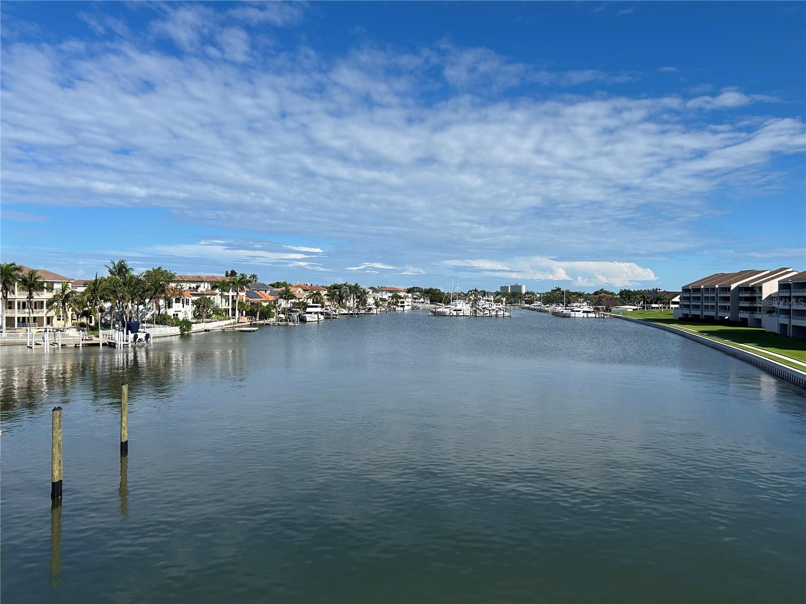 Beautiful Waterfront unit located in the gated community of Pasadena Yatch and Country Club. New tile floors, plantation shutters, updated
kitchen, wet bar and 2 under building parking spaces. Enjoy the beautiful water and marina view from your large covered balcony. Pasadena
Yacht and Country Club is a gated community that has an 18 hole award winning golf course, a clubhouse with a heated Jr. Olympic size
community pool, a fitness center, two restaurants and a pool bar an grill. MEMBERSHIPS FOR GOLF, FITNESS AND THE YACHT CLUB ARE
OPTIONAL AND HAVE AN ADDITIONAL CHARGE. Boat slips are available for sale and rent.