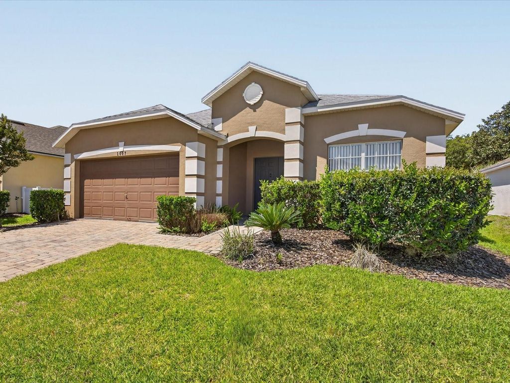 Photo of 1007 Balmoral Dr, Davenport, FL 33896 (MLS # O6400432)