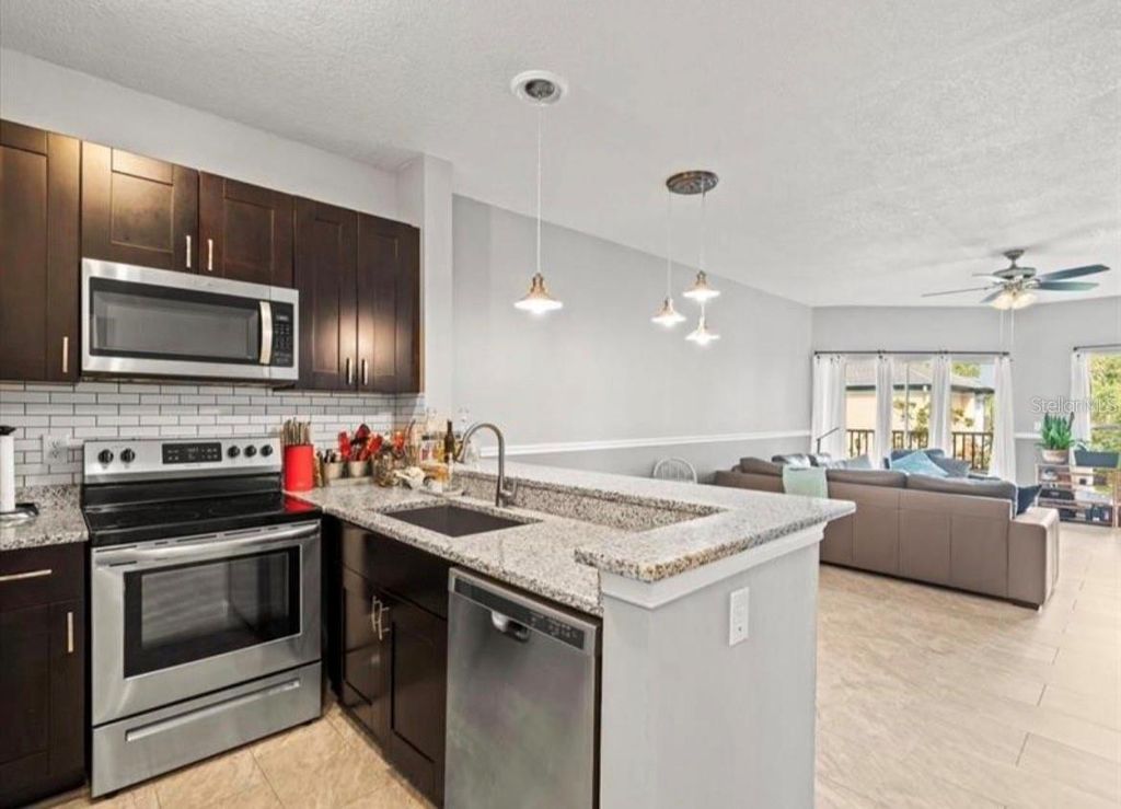 Photo of 4115 Chatham Oak Court #222, Tampa, FL 33624 (MLS # TB8485593)