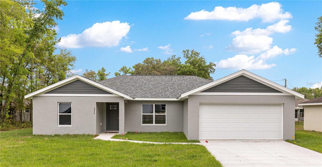 Photo of 13 Fisher Run Terrace, Ocklawaha, FL 32179 (MLS # OM732847)