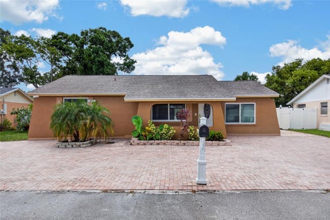 Photo of 6711 Glen Forest Court, Tampa, FL 33615 (MLS # TB8532701)