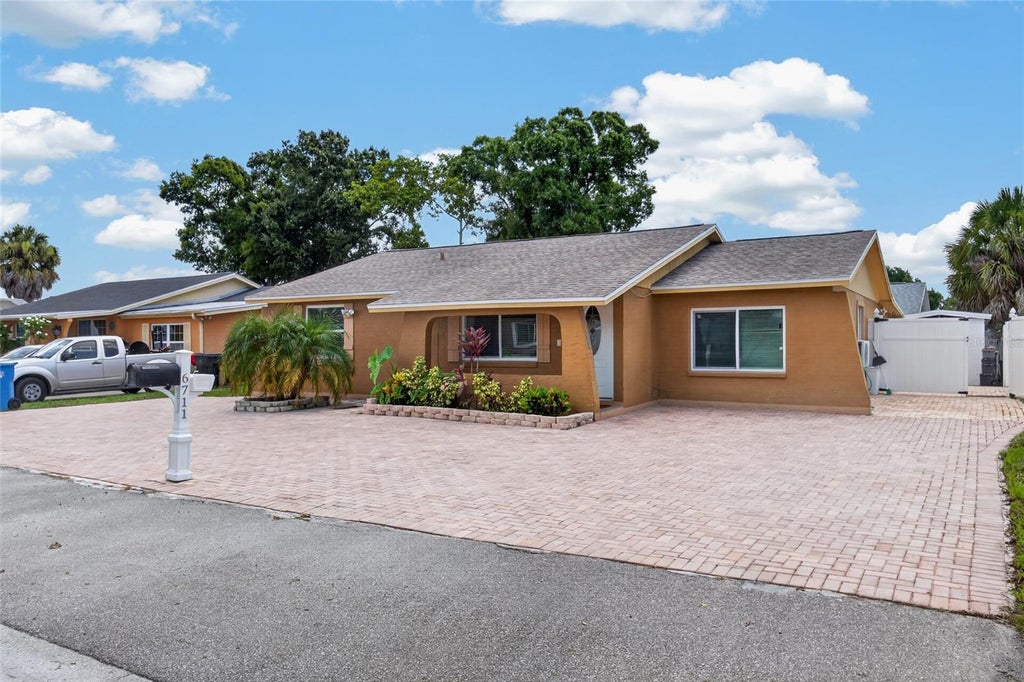 Photo of 6711 Glen Forest Court, Tampa, FL 33615 (MLS # TB8532701)