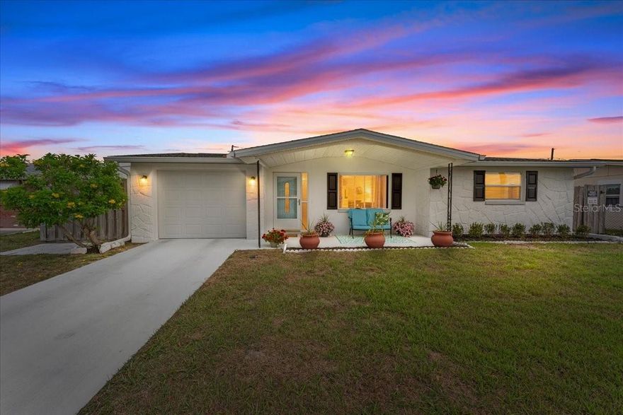 Imagine stepping into your own slice of sunshine, a darling, move-in-ready home in Holiday, Florida, that feels like a warm hug from the moment you arrive. This charming single-family residence, with its fresh interior and exterior paint, welcomes you with bright, inviting spaces and thoughtful updates throughout. Nestled in a prime location, you're just minutes from multiple beautiful beaches and state parks, including Fred Howard Beach, Sunset Beach, and Anclote Park, all within a quick 15-minute drive. Craving city convenience? Tampa International Airport is an easy 40-minute drive away, making travel effortless while keeping you close to the relaxed coastal vibe you crave.
Inside, you'll find two generously sized bedrooms and an updated full bathroom, plus brand-new carpet underfoot for that fresh, cozy feel. The updated kitchen invites you to linger over morning coffee at the counter, while the dedicated indoor laundry room (conveniently housed in the partially converted one-car garage) offers excellent flexibility, it could easily be converted into a second full bathroom using the existing plumbing lines. Need the full garage back? Just remove the wall; the flexibility is built right in.
Major mechanicals have been recently updated for true peace of mind: a 2022 roof, 2021 HVAC, a brand-new 2026 water heater, and a new garage door (installed 2021). No surprises here, just reliable comfort waiting for you.
Step outside and discover your own private retreat. A fully fenced backyard offers space to play, garden, or unwind, while the covered back patio is perfect for evening breezes, weekend barbecues, or simply watching the sky change colors. Best of all, this patio could be enclosed to create approximately 250 sq ft of additional living space, giving you the option to expand the home and increase its value with minimal effort. The photos say it all, this home is as cheerful and welcoming as it looks. This property is perfect for first-time homebuyers looking to plant roots, savvy investors seeking strong rental potential, or snowbirds wanting an affordable, low-maintenance coastal getaway with no HOA or deed restrictions. It's low maintenance, thoughtfully updated, and full of potential to create beautiful memories for years to come, all while enjoying easy access to Gulf beaches, parks, and Tampa Bay area amenities.
Come see how this home can feel like yours. Your story begins here…