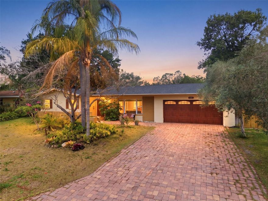 Lovely 3-bedroom, 2-bath home in desirable Clearwater, located less than 3 miles from vibrant downtown Dunedin. This home features several valuable updates, including a new roof in 2020, updated windows and doors, as well as tastefully selected light fixtures and ceiling fans throughout the home that cohesively blend together to create a stylish, updated feel. A large front window fills the living room with natural light, creating a bright and welcoming atmosphere that flows seamlessly into the dining area. Sliding glass doors from the dining room, kitchen, and primary bedroom provide easy access to the outdoor living space and beautiful backyard views. The kitchen overlooks the spacious backyard, perfect for entertaining or relaxing. If a garage is a must, this 2 car garage offers lots of space and has a beautiful paver base for a great esthetic design.

The generously sized primary suite features French doors leading to an en-suite bath complete with a walk-in closet, vanity area, and an updated oversized bathroom. Step outside to a large covered patio area, ideal for entertaining, gatherings, or enjoying Florida living year-round. The spacious backyard is beautifully landscaped and offers plenty of room to relax or play.

The location is hard to beat — close to shopping, dining, beaches, and major roadways. Nearby US-19 provides convenient access south to St. Petersburg or north to Tarpon Springs, both within approximately 30 minutes. World-famous Clearwater Beach and Honeymoon Island State Park are both within 20 minutes or less, making this home the perfect blend of comfort, convenience, and coastal living.