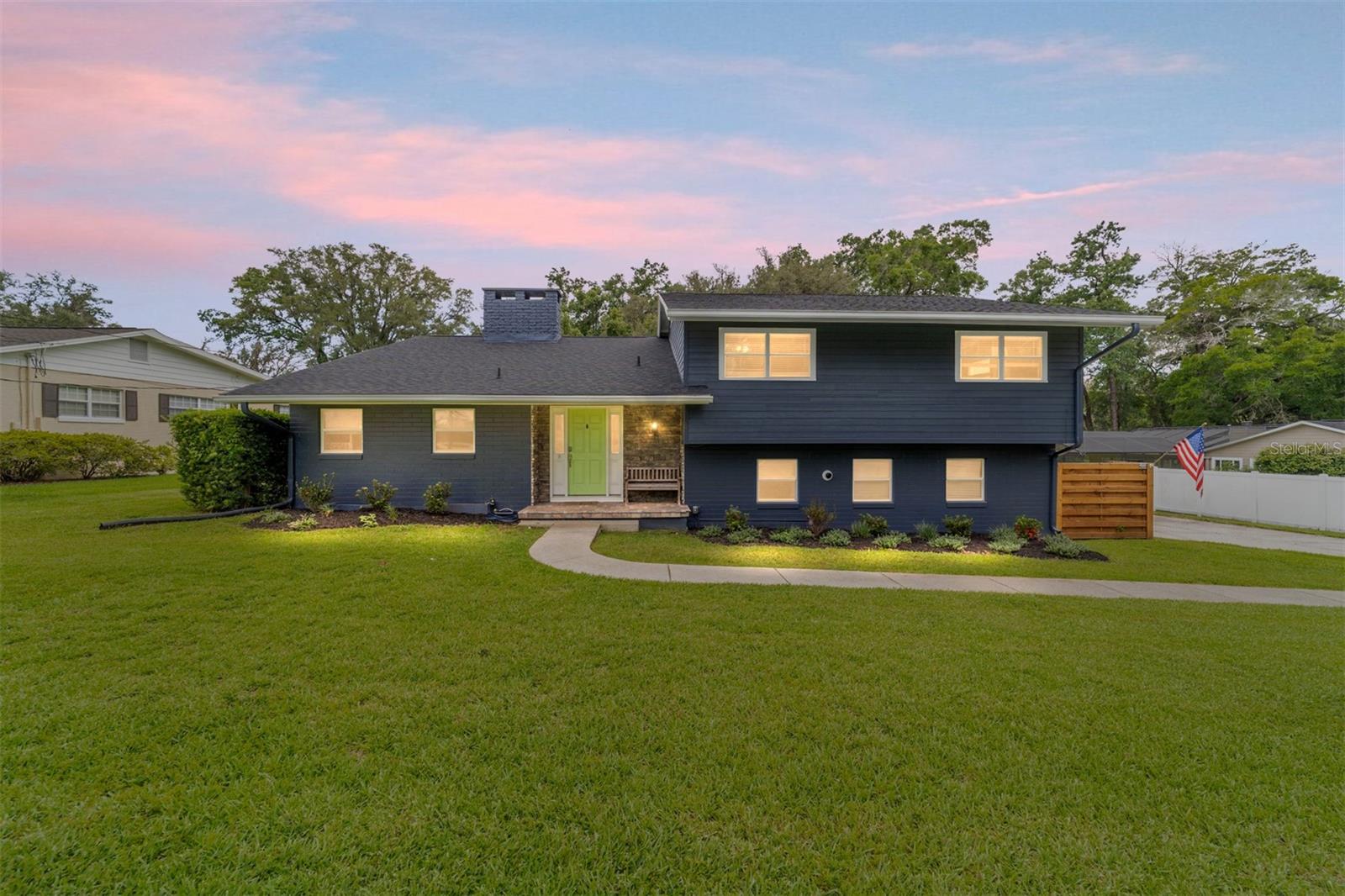 Located just minutes from Ocala’s historic district, this beautifully updated 3-bedroom, 2.5-bath home in the sought-after Woodfields neighborhood offers the perfect blend of character, comfort, and convenience.
Step inside to discover a stunning chef’s kitchen featuring a 6-burner gas cooktop with griddle, double ovens, a wine fridge, farmhouse sink, and a bar-height island—perfect for entertaining or gathering with family. The spacious dining area easily accommodates a large table for hosting.
This split-level home offers multiple living spaces, including an upstairs family room with a cozy wood-burning fireplace, where all three bedrooms are conveniently located. The primary suite is light-filled and spacious, featuring a beautifully updated bathroom and generous walk-in closet. Two additional bedrooms share a modernized full bath. and both ample closet space.
Downstairs, enjoy a second family/game room, a home office, and a large enclosed porch that could double as a gym. Step outside to your private backyard retreat—complete with a covered patio, a large in-ground pool and spa, and a whimsical treehouse. There’s even an additional storage building for your tools or hobbies.
Tucked away for privacy and offering beautiful sunsets in the evenings, this home truly has it all. Easy to show—don’t miss your chance to make it yours!