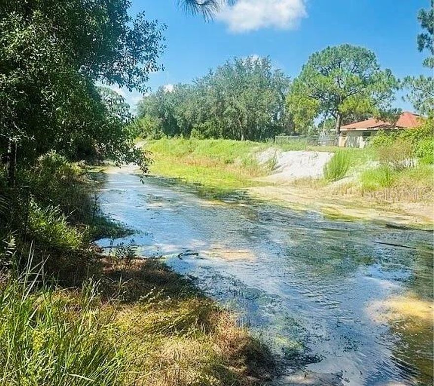 WATERFRONT!! This .23-acre vacant lot is situated in the charming town of Lake Placid, Florida, in the desirable Placid Lakes community. Zoned residential, this property offers a fantastic opportunity to build your dream home or a getaway retreat. The lot is conveniently located on a peaceful canal, providing access to serene waters right from your backyard – perfect for kayaking, fishing, or just enjoying the view.  Lake Placid is known as the "Caladium Capital of the World," famous for its beautiful lakes and charming small-town atmosphere. Located in Central Florida, Lake Placid is a haven for outdoor enthusiasts, offering plenty of opportunities for boating, fishing, and wildlife viewing. The Placid Lakes community is a peaceful neighborhood, ideal for those seeking a quiet retreat while being close to local amenities and attractions.  Southwest Florida International Airport (RSW) – 90 miles (approximately 1.5 hours by car)  Orlando International Airport (MCO) – 100 miles (about 1 hour and 45 minutes by car)  Venice Beach – 90 miles (approximately 1.5 hours by car)  Clearwater Beach – 115 miles (around 2 hours by car)  Whether you’re looking to invest in a beautiful piece of land or build a serene lakeside retreat, this lot offers the perfect blend of natural beauty and convenience. Don't miss out on this rare opportunity to own a piece of paradise in Lake Placid!