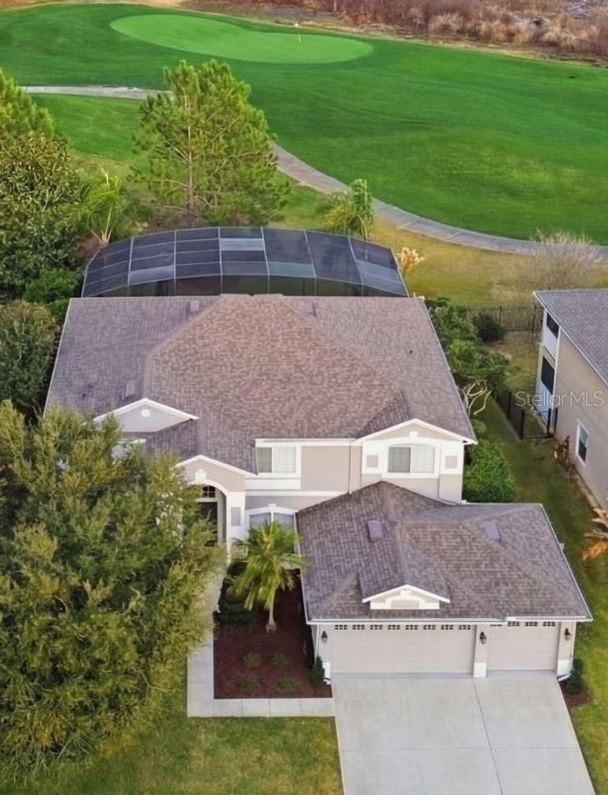 Welcome to your dream, golf-front retreat in North Shore at Lake Hart, one of the most sought-after communities in Lake Nona!
Perfectly positioned on the 17th green, this meticulously maintained 5-bedroom, 3-bath pool home offers 3,522 square feet of exceptional living space with breathtaking views of the par-3, 17th hole. Enjoy true Florida living with a newly resurfaced PebbleTec pool and spa (2023) that creates a stunning backdrop for relaxing or entertaining. The expansive pool deck offers generous space for gatherings, includes a convenient utility sink, and is complemented by a full second-story screened balcony spanning the back of the home—ideal for taking in sweeping golf course views.
Inside, the home features a thoughtful and versatile layout. The primary suite is located upstairs and serves as a private retreat, complete with tray ceilings, two walk-in closets, and sliding glass doors opening to the oversized balcony overlooking the pool and fairway. The beautifully updated en-suite bath includes a sunken soaking tub, glass-enclosed walk-in shower, split granite vanities, & a separate water closet. Upstairs also includes 3 additional bedrooms, a spacious bonus room perfect for a media room, playroom, or fitness space, and a secondary bath with double granite vanities and a shower/tub combo. Sliding doors from both the bonus room and one of the bedrooms provide direct balcony access.
Downstairs, the fifth bedroom (currently used as an office) sits adjacent to a fully updated third bath featuring granite countertops and a glass-enclosed walk-in shower—conveniently located with easy access to the pool area. The first floor also offers a formal living room, a formal dining room with real hardwood floors (which continue up the staircase into the upstairs hallway), and a spacious family room at the rear of the home with oversized, new, double sliding glass doors that fully open up to the screened pool deck, creating seamless indoor-outdoor living.
The upgraded kitchen overlooks the family room and breakfast nook, all with views of the backyard & golf course. It features quartz countertops, a large island, 42" cabinetry, and stainless steel appliances—perfect for both everyday living and entertaining.
Additional highlights include: *Indoor laundry room with abundant storage & utility sink * washer and dryer included *An oversized 3-car garage with brand-new polyaspartic flooring (Nov 2025), workshop space, overhead and standing storage racks  *Garage refrigerator and standalone freezer included *Whole-house water filtration system *Transferable termite bond *Gutters around entire home
Major updates include: *A/C units replaced in 2018 & 2022 *Roof replaced in 2017 *Newer 80-gallon water heater *Pool & spa resurfaced with PebbleTec (2023).

This exceptional golf-front home offers luxury, comfort, and spectacular views in a prime Lake Nona location—just minutes from Medical City, top-rated schools, shopping, dining, and major highways, attractions and close proximity to the Orlando International airport and just a short drive to Florida’s beautiful beaches.
Enjoy top-tier community living with, amenities including a resort-style community pool, indoor fitness center, basketball and tennis courts, playground, baseball field and golf course access. This is more than a home, it’s the ultimate Lake Nona, golfing lifestyle. Schedule your private showing today and experience it for yourself!