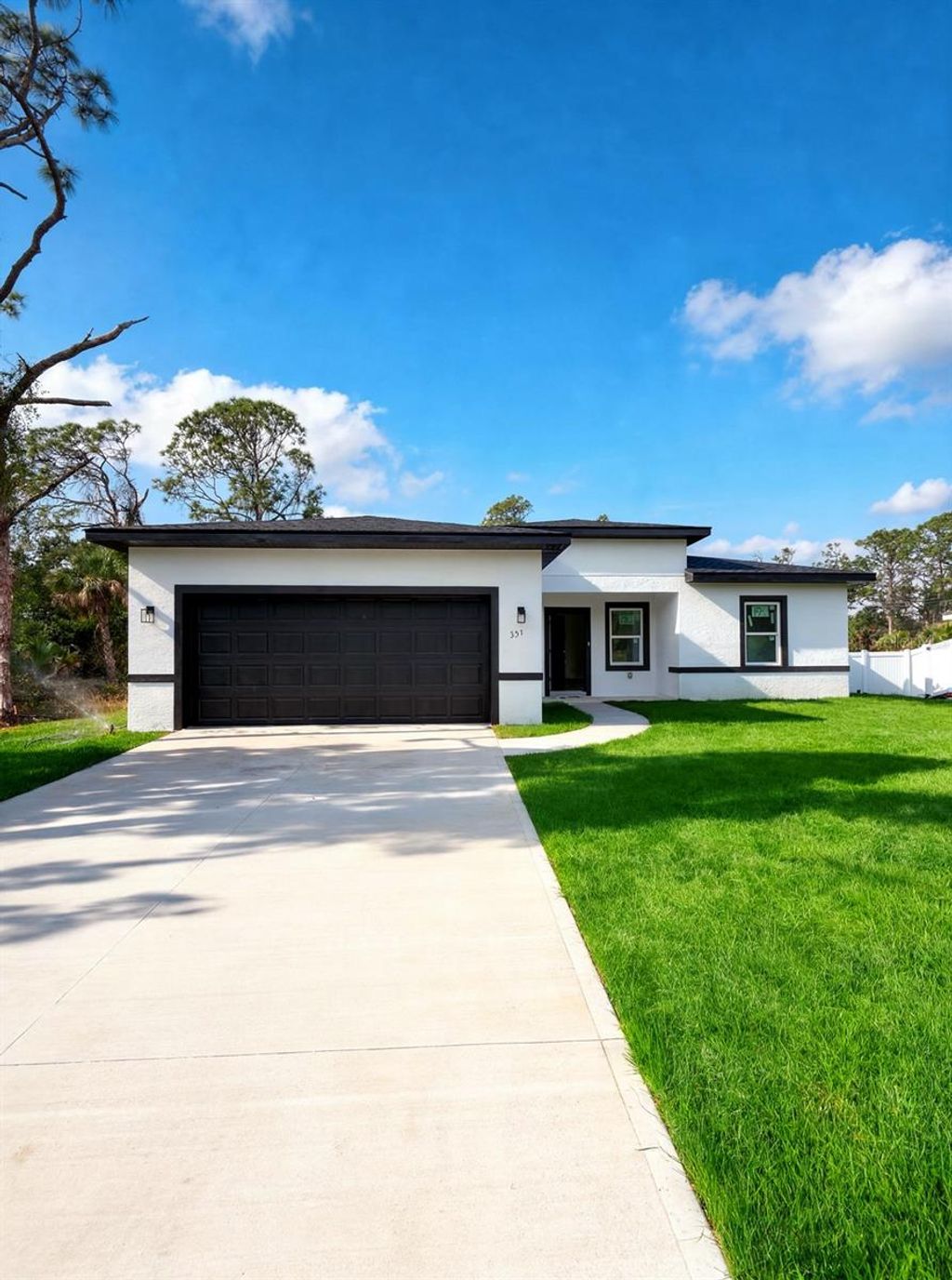 Photo of 351 Tenk Street, Port Charlotte, FL 33953 (MLS # O6394886)