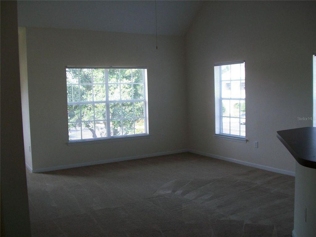 Photo of 12807 Madison Pointe Circle #203, Orlando, FL 32821 (MLS # O6396901)