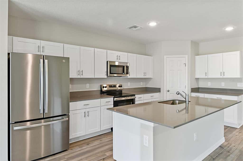 Photo of 3911 Altitude Run, Davenport, FL 33837 (MLS # TB8535255)