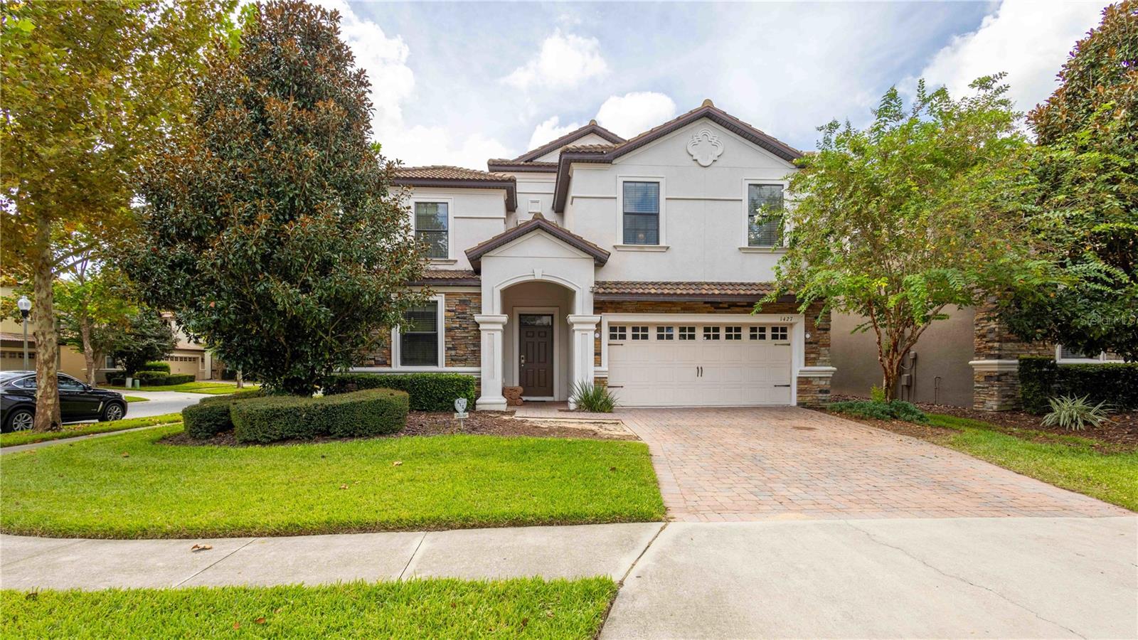 Investor Alert – 9 Bedrooms on a Corner Lot, Just Steps from the Clubhouse, 1427 Moon Valley Drive offers one of the most desirable setups in ChampionsGate. Sitting on a large corner lot and only a short walk to the Oasis Club, this 9-bedroom, 5-bath home is fully furnished and short-term rental approved. Proximity to the clubhouse is one of the most requested features in ChampionsGate and this home delivers. Inside you’ll find an open kitchen with granite counters, stainless steel appliances, and plenty of space for entertaining. Multiple dining areas, a spacious living room, and an upstairs loft make it easy to host large groups—exactly what vacationers are looking for. Themed bedrooms add character and fun, while the private screened pool and spa give guests their own resort-style retreat. Location is everything, and being within walking distance to the clubhouse is a major advantage. Guests love the convenience of the Oasis Club’s water park, lazy river, tiki bar, fitness center, movie theater, sports courts, and more. That kind of access directly translates into higher demand, stronger reviews, and repeat bookings. With the right management, similar 9-bedroom homes in ChampionsGate have grossed well into six figures annually. Whether you’re looking to expand your portfolio or get started in the short-term rental market, this home offers the size, location, and potential to perform.