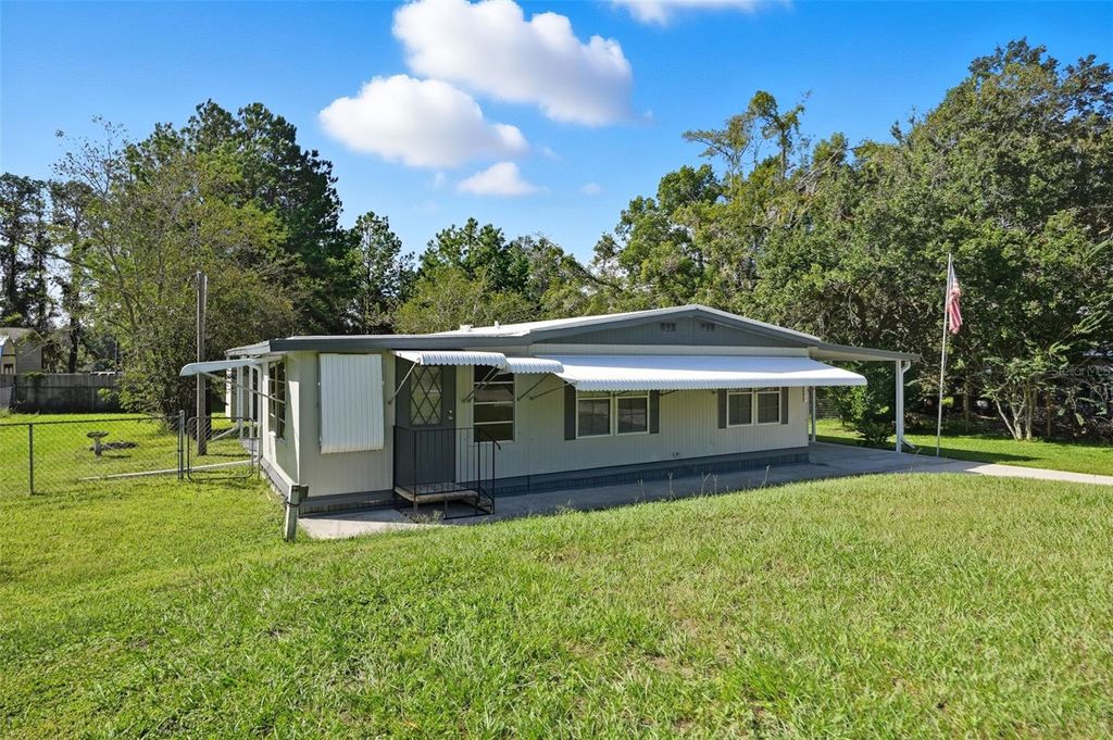 Photo of 18100 Celia Avenue, Brooksville, FL 34604 (MLS # W7879896)