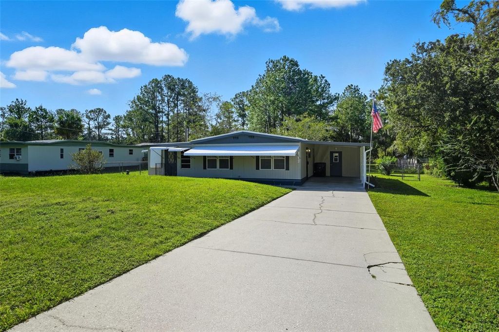 Photo of 18100 Celia Avenue, Brooksville, FL 34604 (MLS # W7879896)