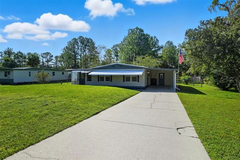 Photo of 18100 Celia Avenue, Brooksville, FL 34604 (MLS # W7879896)