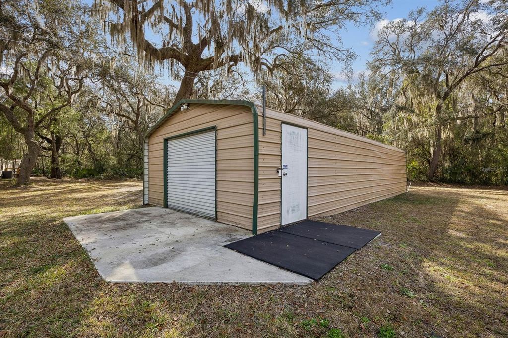 Photo of 111 Fairway Lane, Crescent City, FL 32112 (MLS # GC537789)