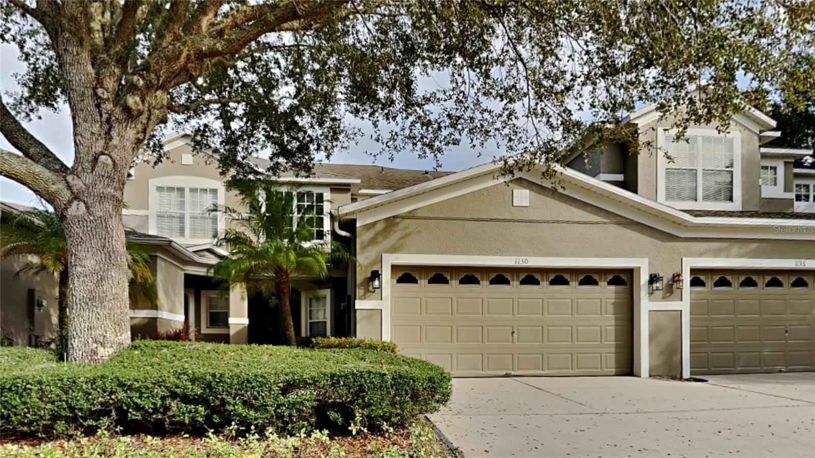 Welcome to this fabulous 3 bed 2.5 bath townhouse in the heart of Ocoee. As you enter this two story unit you find all living, dining, and entertaining areas on the first floor and all bedrooms and 2 bathrooms on the second floor. This unit has high ceiling, fresh interior paint, new carpet in the bedrooms, NEW ROOF Coming Soon (Pending HOA approval), Water heater 2022, HVAC 2019. The kitchen is modern with 42" upper cabinets complete with crown molding, stainless steel appliances, and an eat-in breakfast bar overlooking the family room. Sliding glass doors lead out to the covered and screened lanai which looks out over the grassy green backyard which is the perfect place to enjoy your morning coffee. Located just off 50 with tons of shopping and dining options near by. Schedule your showing today!
