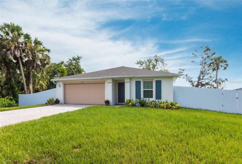 Photo of 2554 Lakeshore Circle, Port Charlotte, FL 33952 (MLS # O6330024)